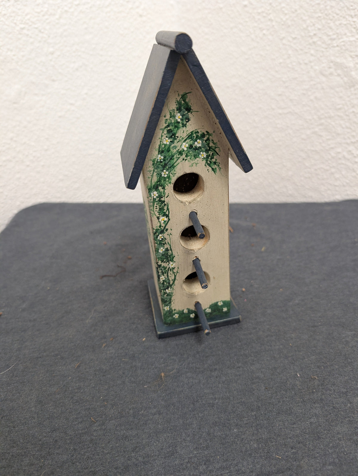 Vintage handcrafted three post tall birdhouse