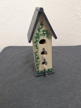 Vintage handcrafted three post tall birdhouse